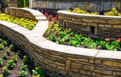 Improve Drainage and Stability with Retaining Wall Repair!